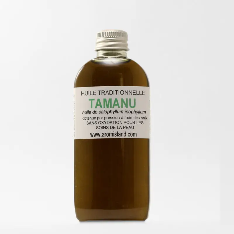 Huile de Tamanu vert pressée à froid dans un flacon